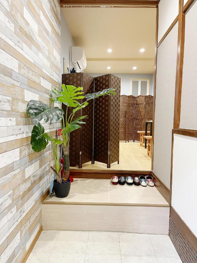 距离namba Shinsaibashi麗子民宿 ヴィラ